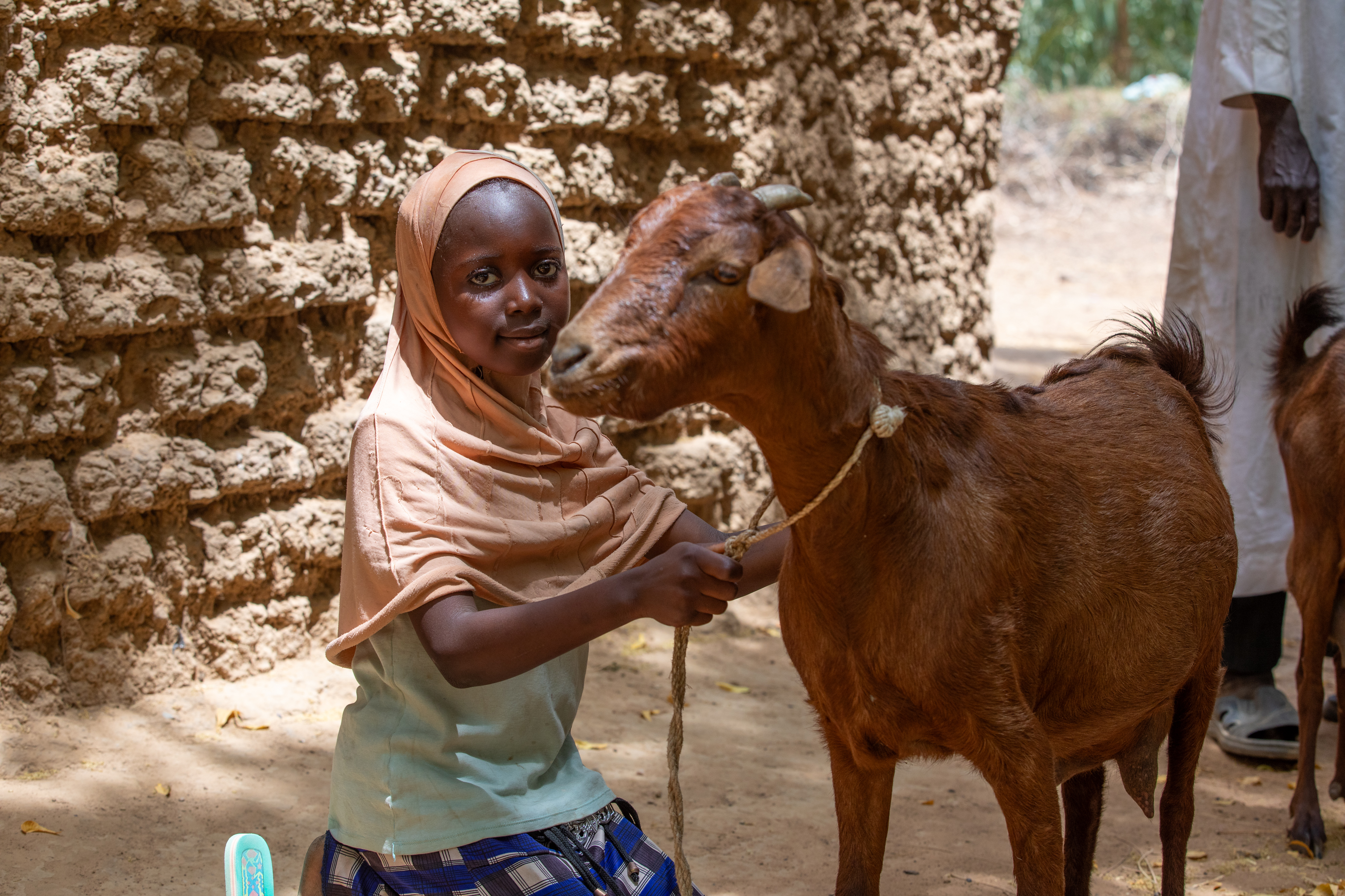 Girl and her Goat in Niger