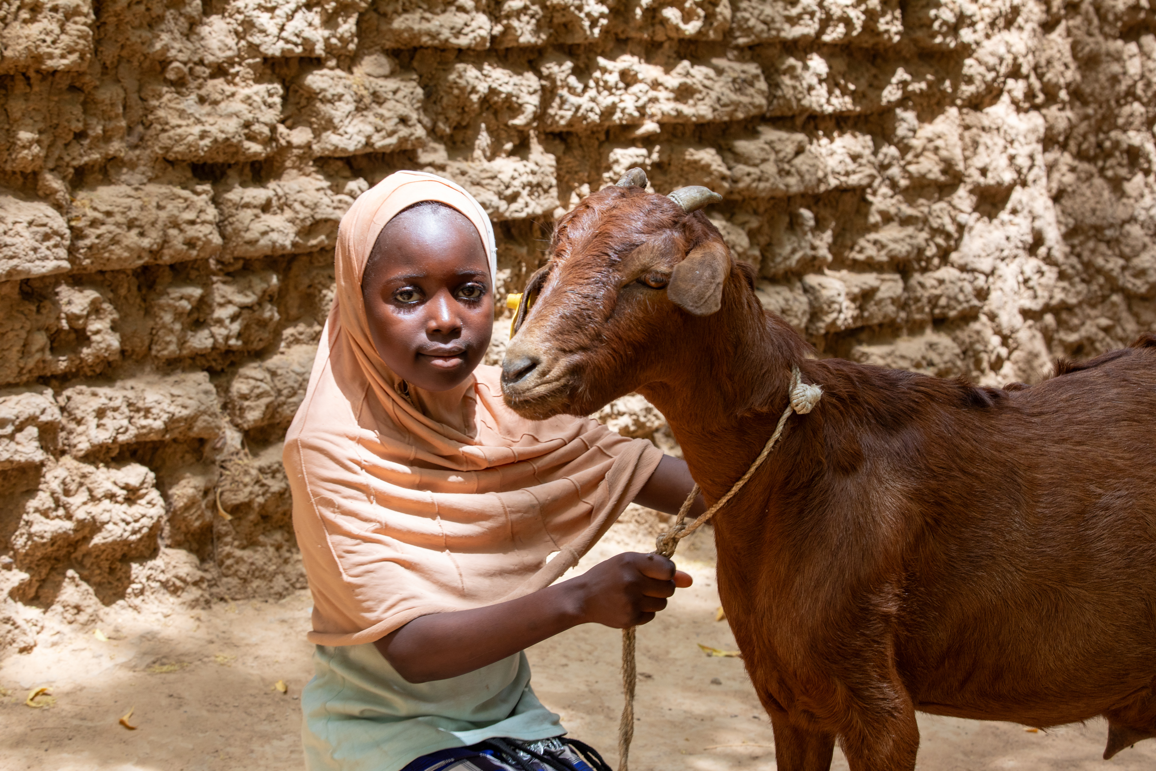 Girl and her Goat in Niger