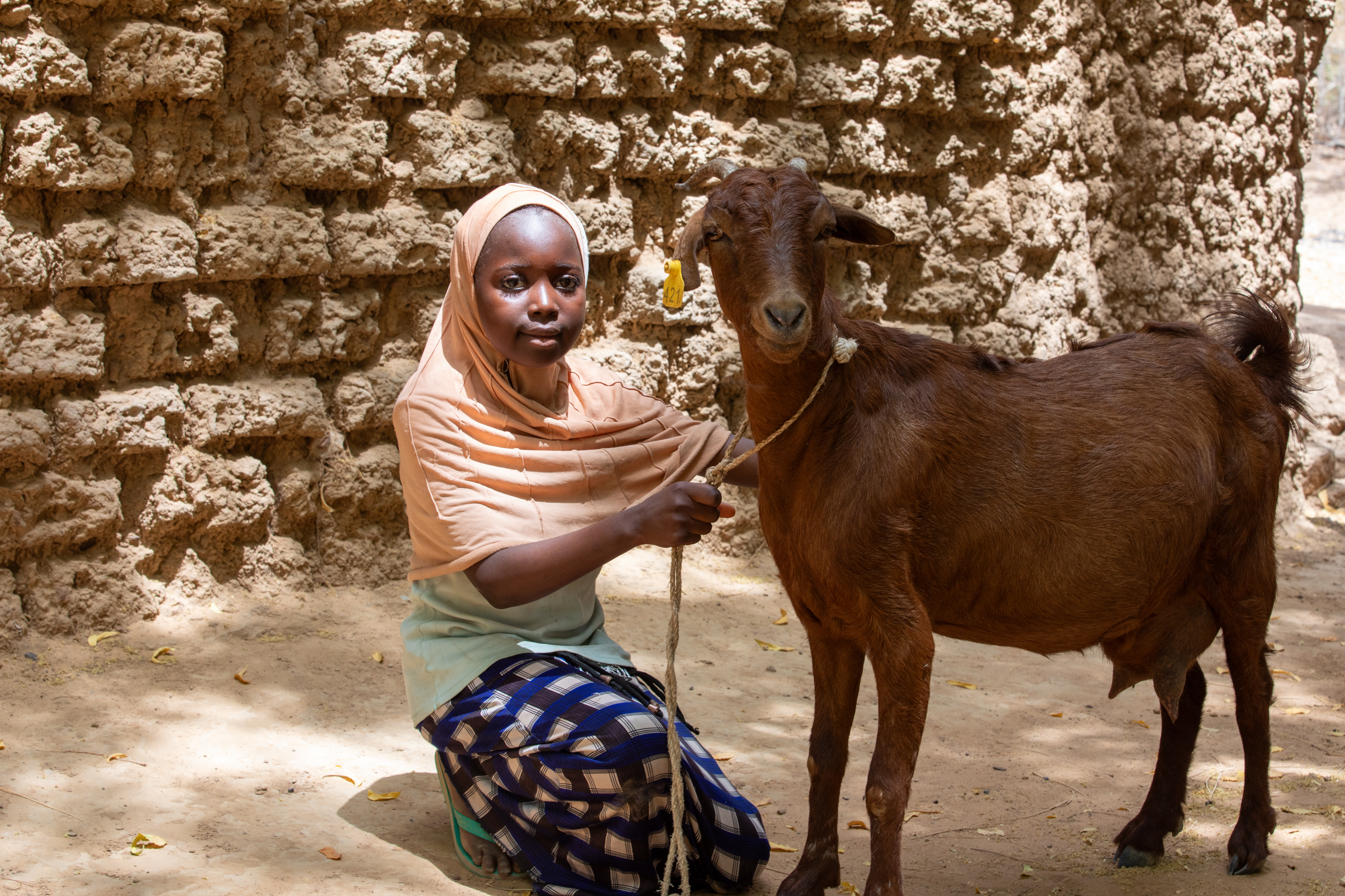 Girl and her Goat in Niger