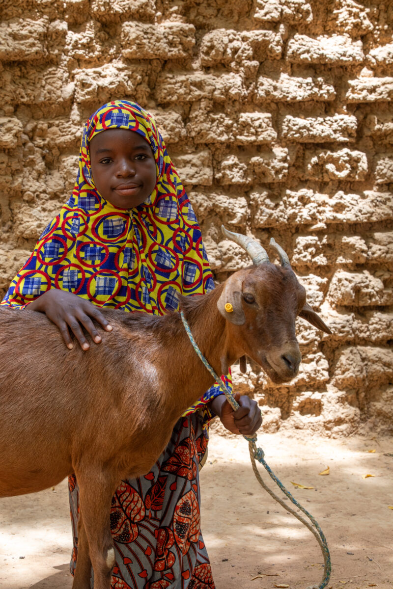 Girl and her Goat in Niger