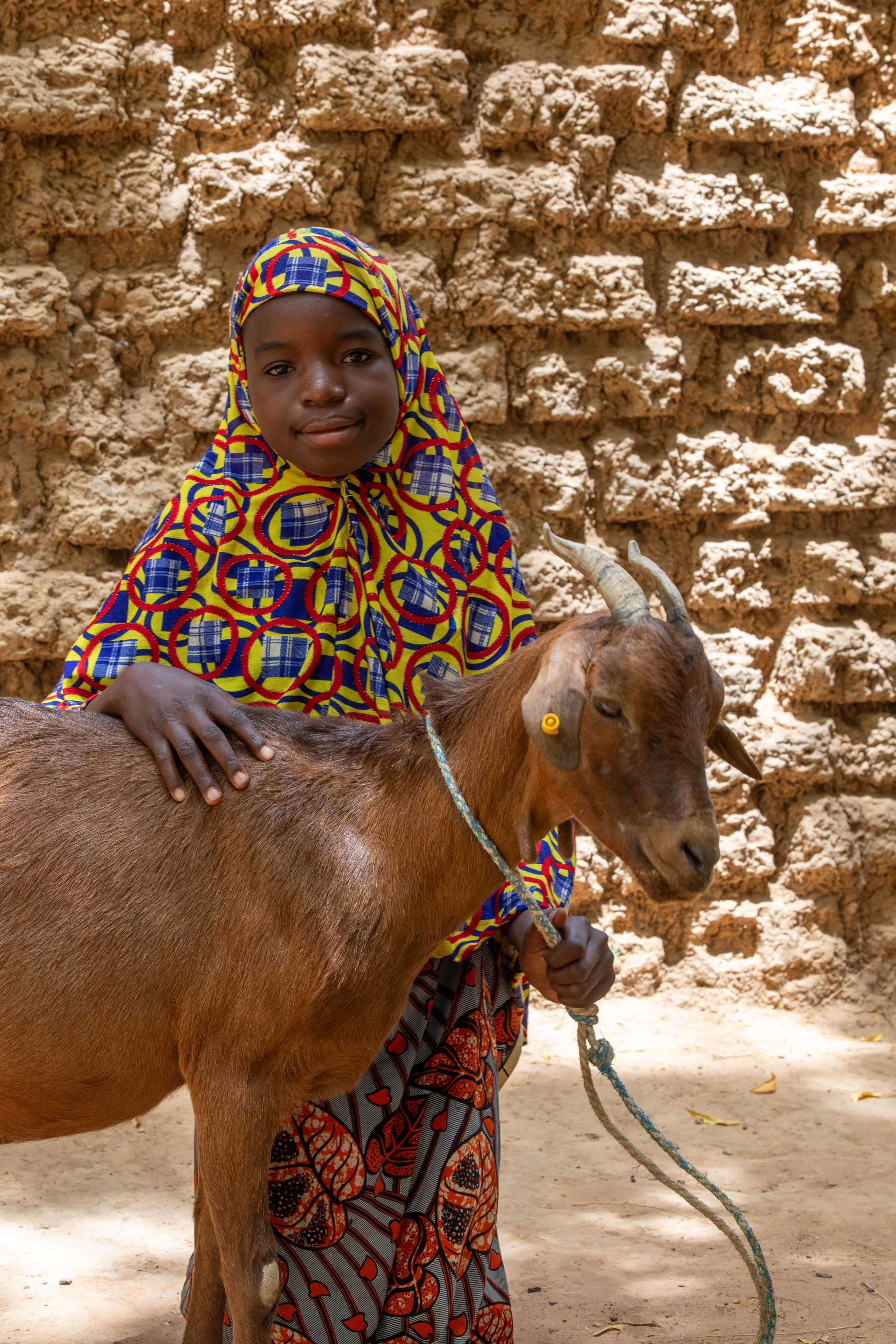 Girl and her Goat in Niger