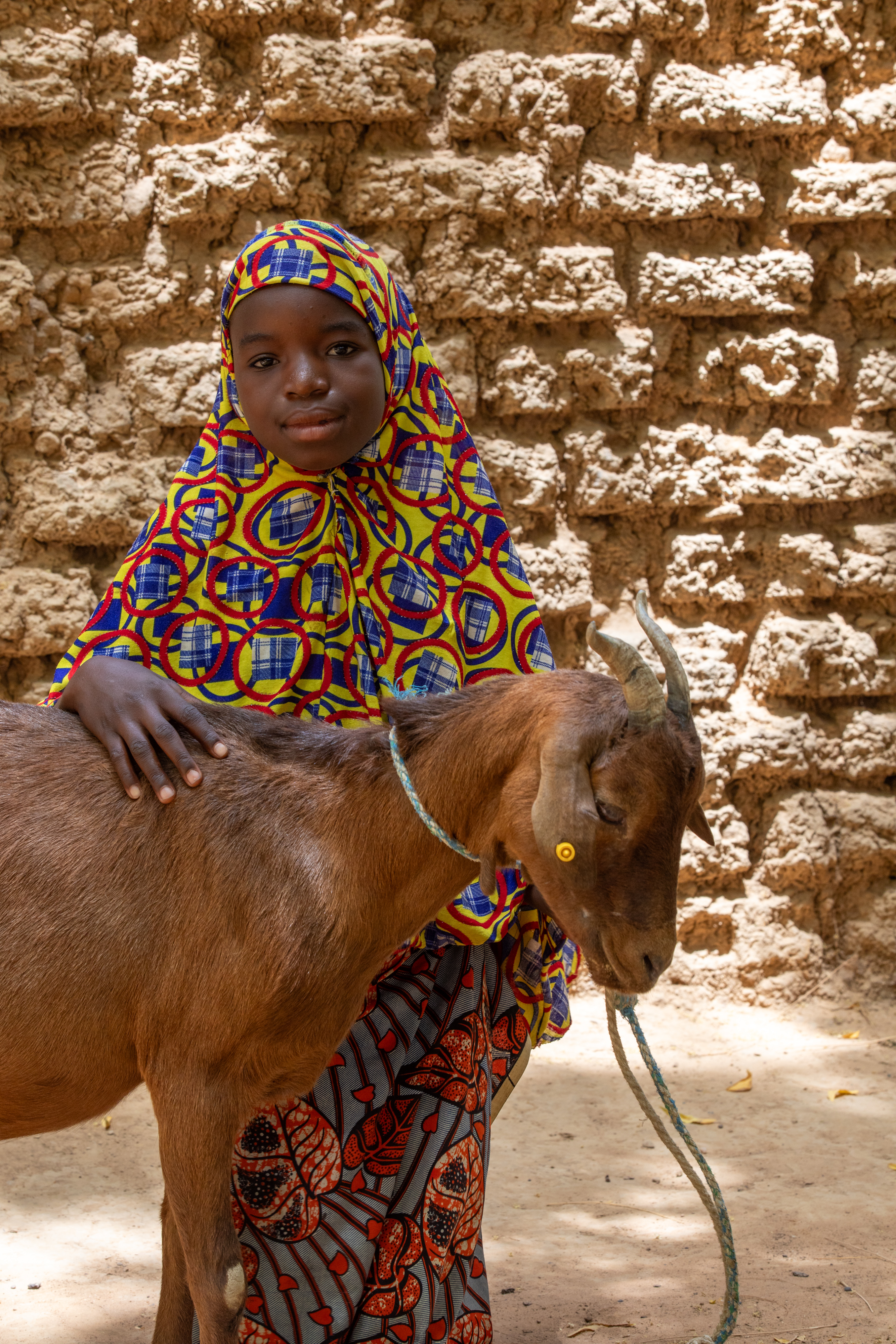 Girl and her Goat in Niger