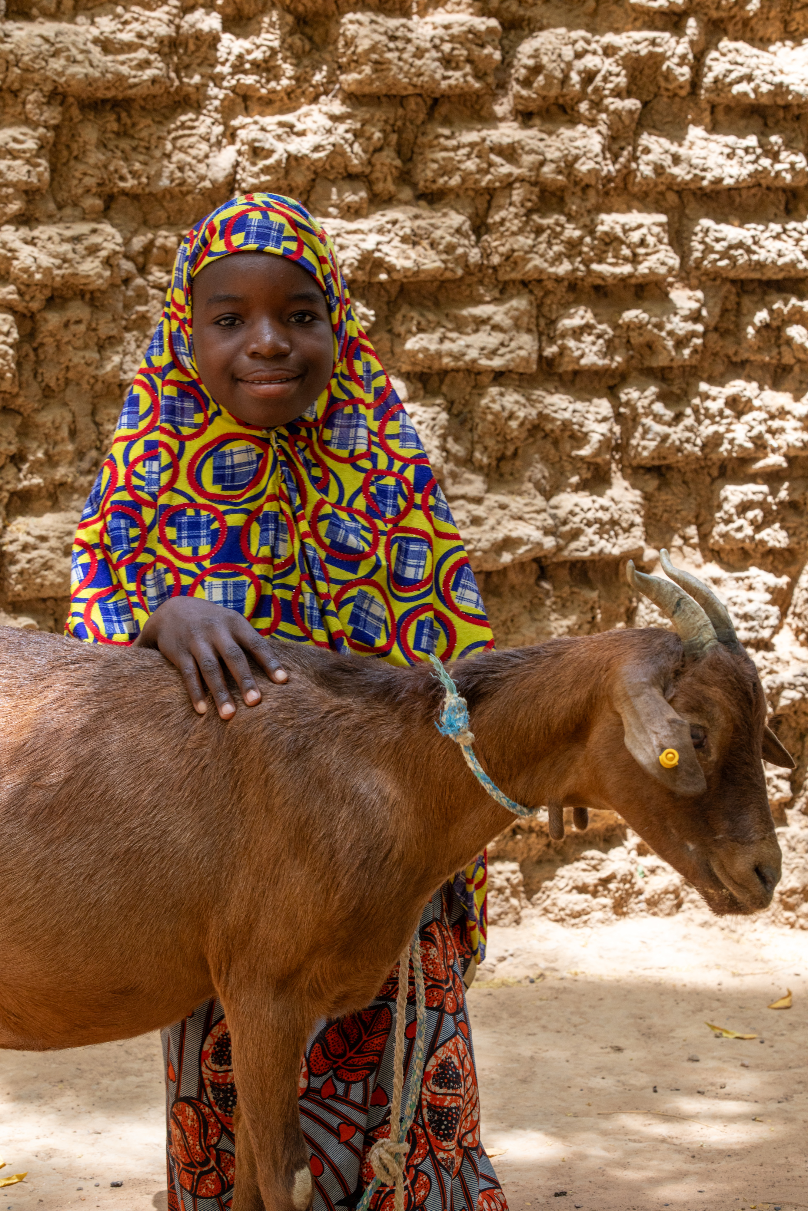 Girl and her Goat in Niger