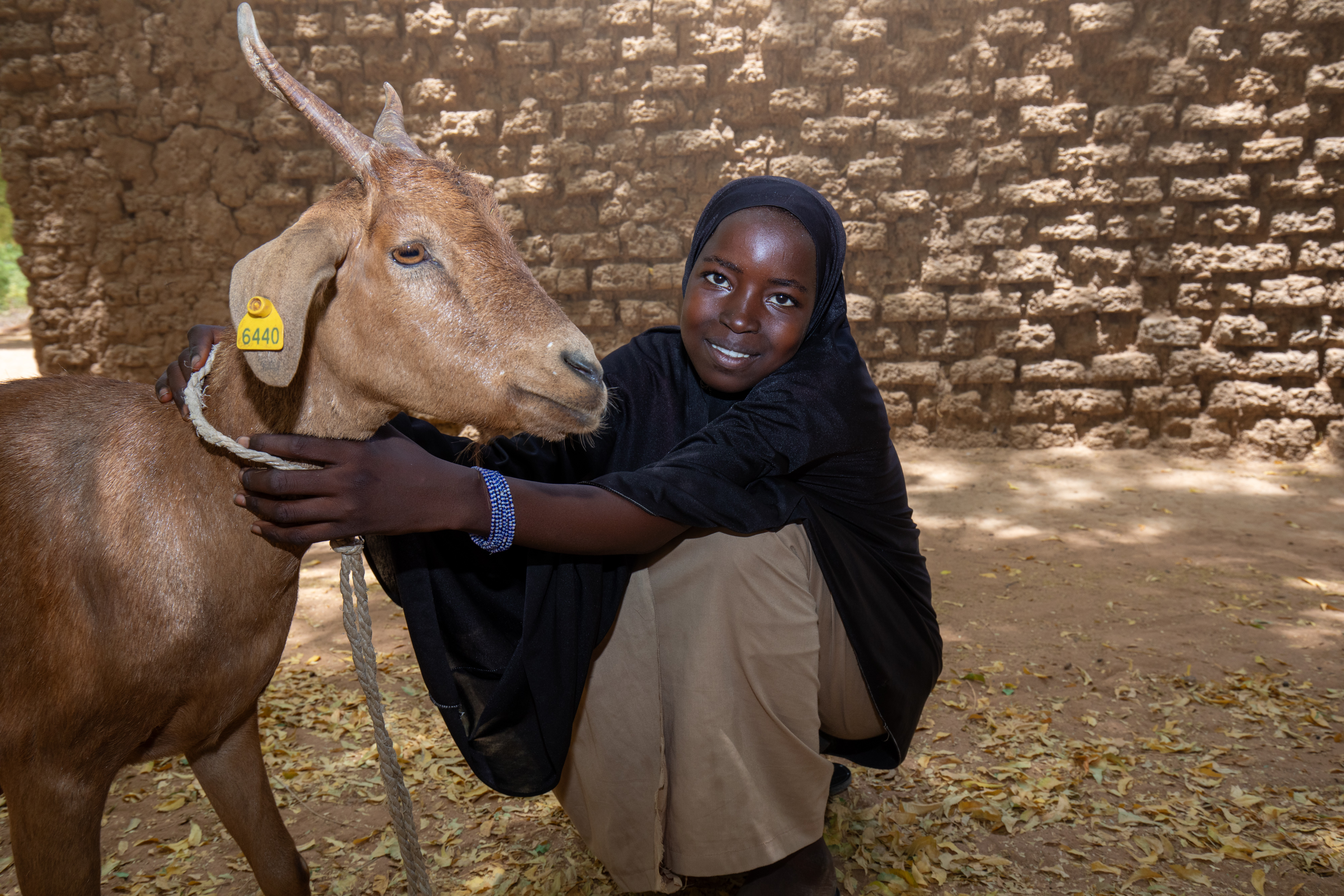 Girl and her Goat in Niger