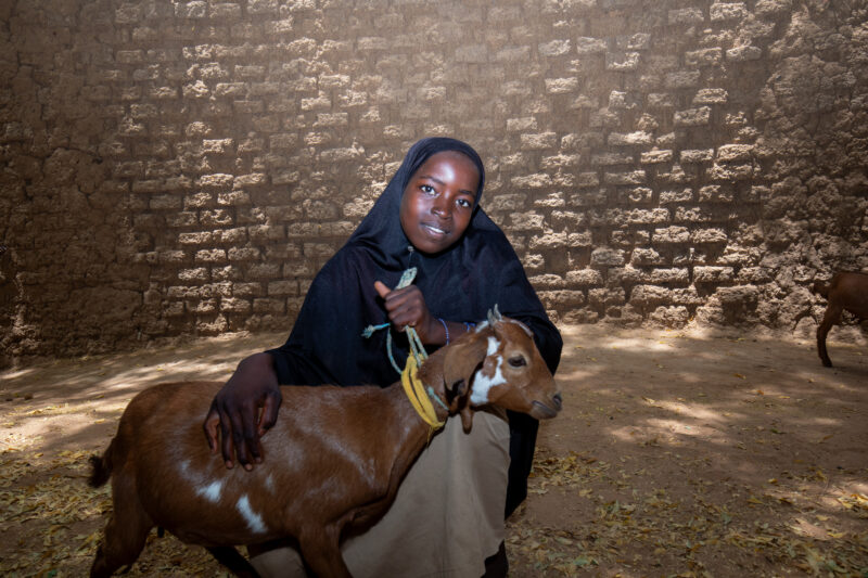Girl and her Goat in Niger — As a way to promote income generation and food security, ADRA provides goats and training on how to take care of goats in Niger,...