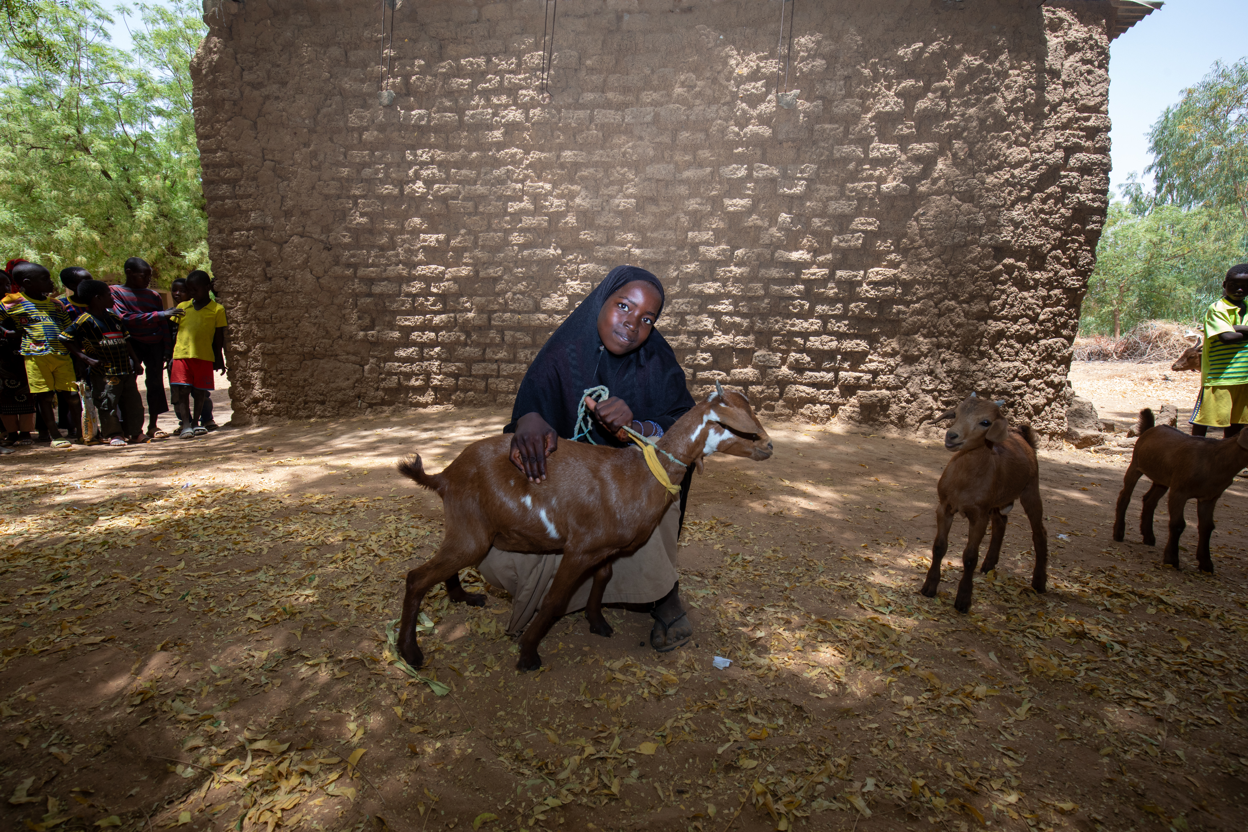 Girl and her Goat in Niger