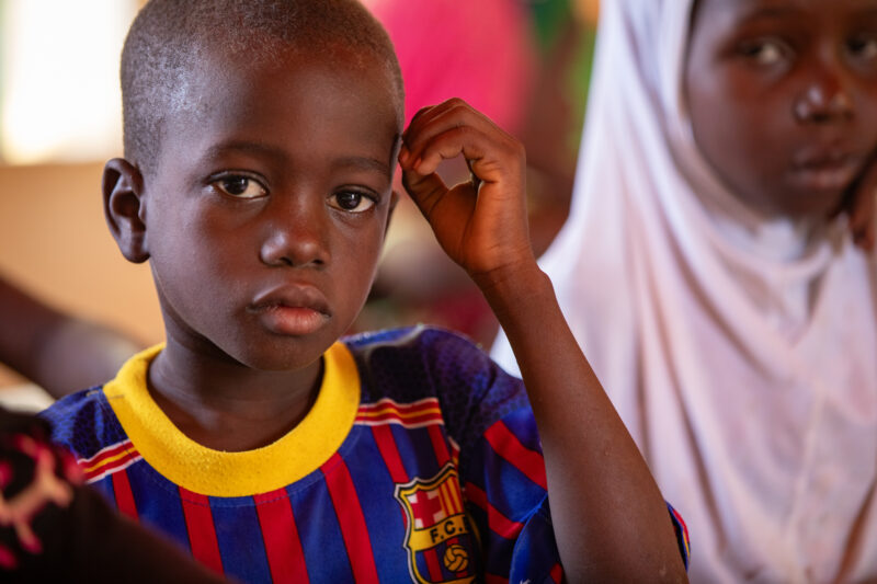 Boy in School in Niger — Young boy attends school in Niger, Africa — Africa, Child, Education, Eyes Open, Frontal Face