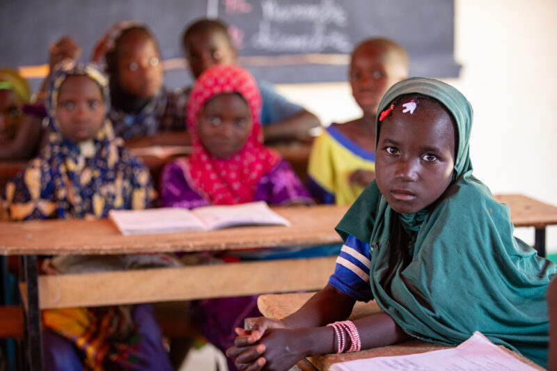 Girl in Niger Attends School — With a long tradition of early marriage, most girls in Niger drop out of school after the second grade — Adult, Africa, Child,...