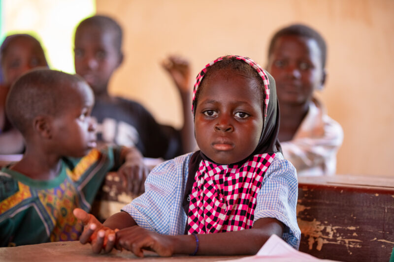 Girl in Niger Attends School — With a long tradition of early marriage, most girls in Niger drop out of school after the second grade — Adult, Africa, Child,...