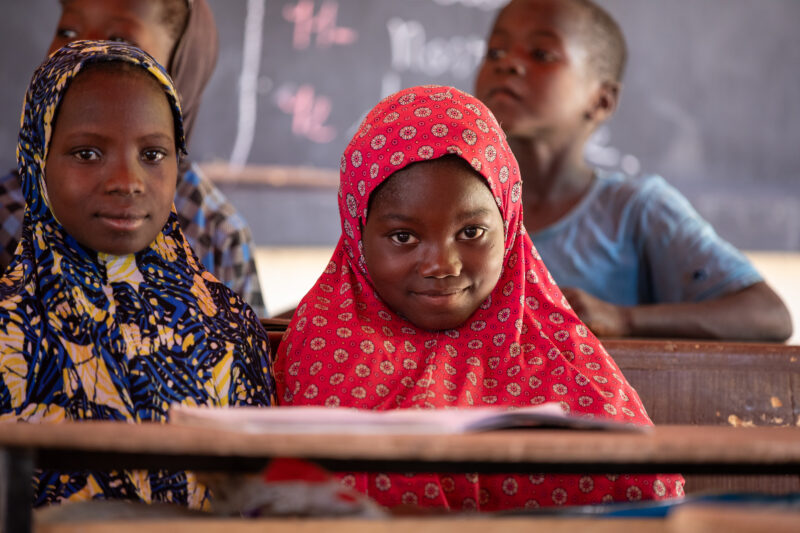 Girl in Niger Attends School — With a long tradition of early marriage, most girls in Niger drop out of school after the second grade — Adult, Africa, Child,...