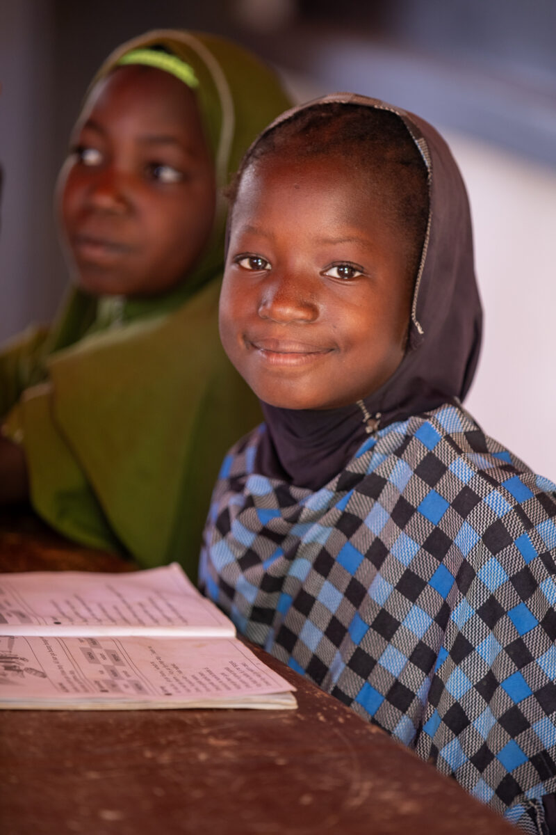 Girl in Niger Attends School — With a long tradition of early marriage, most girls in Niger drop out of school after the second grade — Africa, Child, Educat...