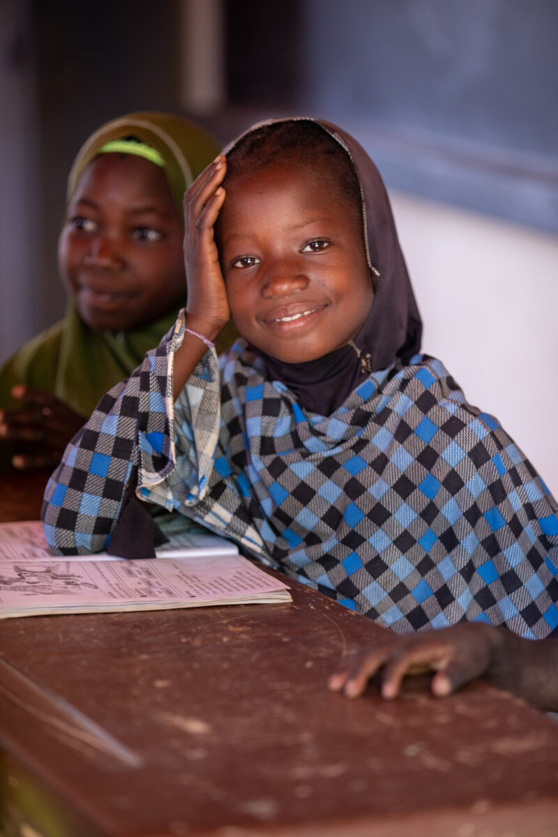 Girl in Niger Attends School — With a long tradition of early marriage, most girls in Niger drop out of school after the second grade — Africa, Child, Educat...