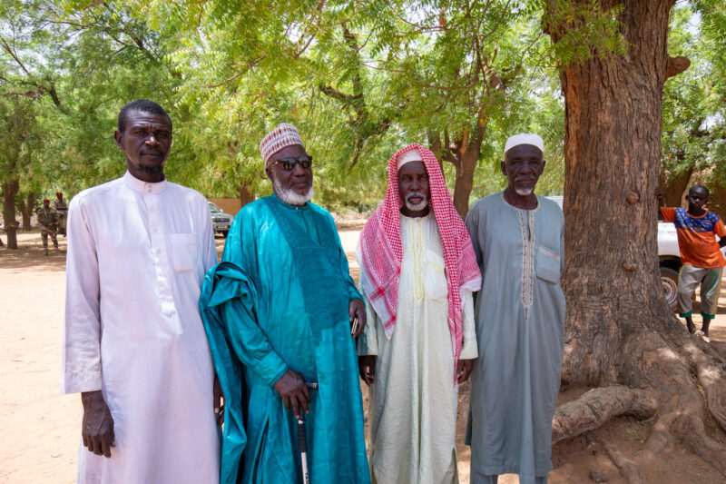 Parent Teacher Group — Parents and teacher Group shot in Niger — Adult, Africa, Beard, Education, Elderly