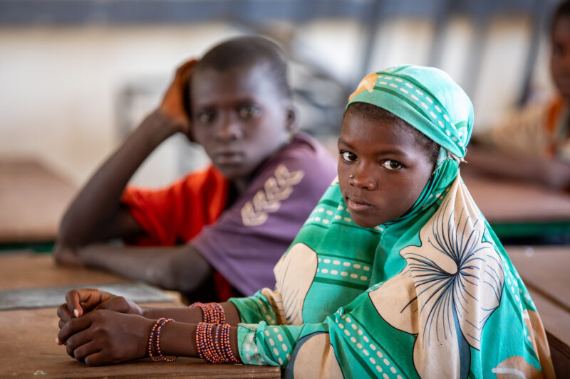 Girl in Niger Attends School — With a long tradition of early marriage, most girls in Niger drop out of school after the second grade — Adult, Africa, Educat...