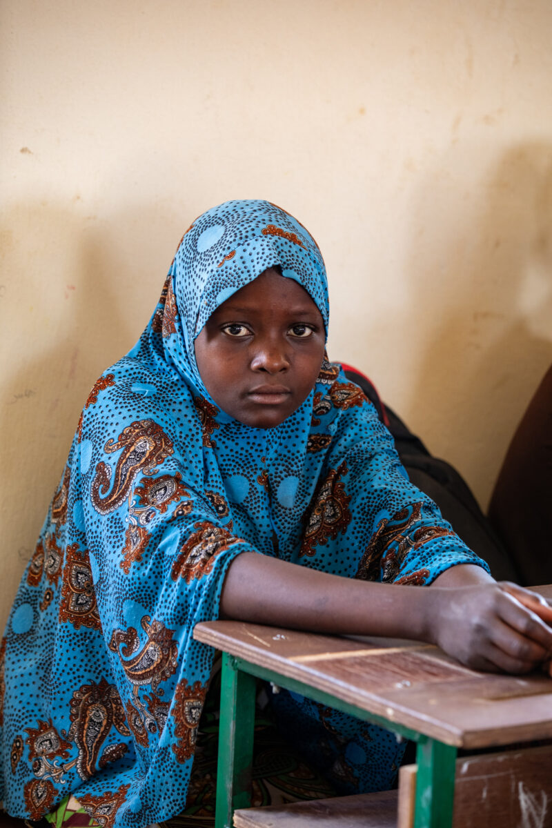 Girl in Niger Attends School — With a long tradition of early marriage, most girls in Niger drop out of school after the second grade — Africa, Child, Educat...