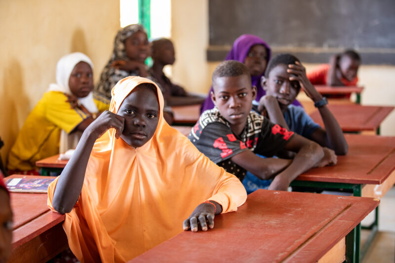 Girl in Niger Attends School — With a long tradition of early marriage, most girls in Niger drop out of school after the second grade — Adult, Africa, Beard,...