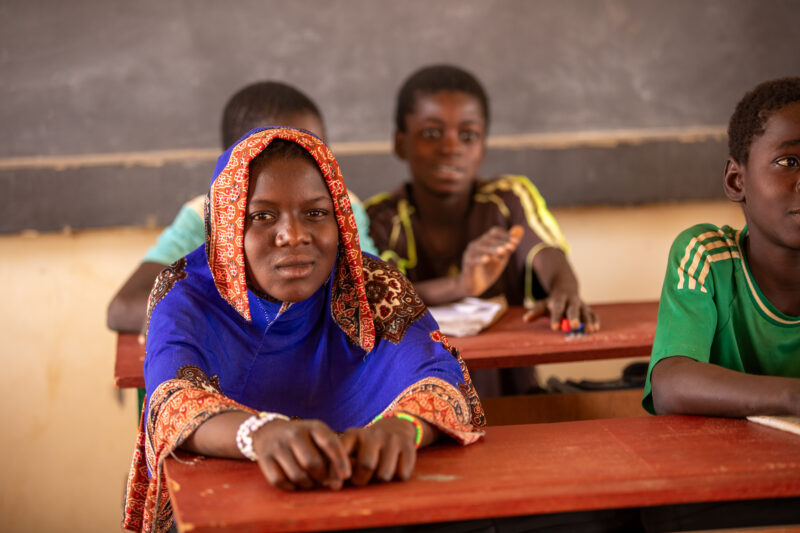 Girl in Niger Attends School — With a long tradition of early marriage, most girls in Niger drop out of school after the second grade — Adult, Africa, Educat...