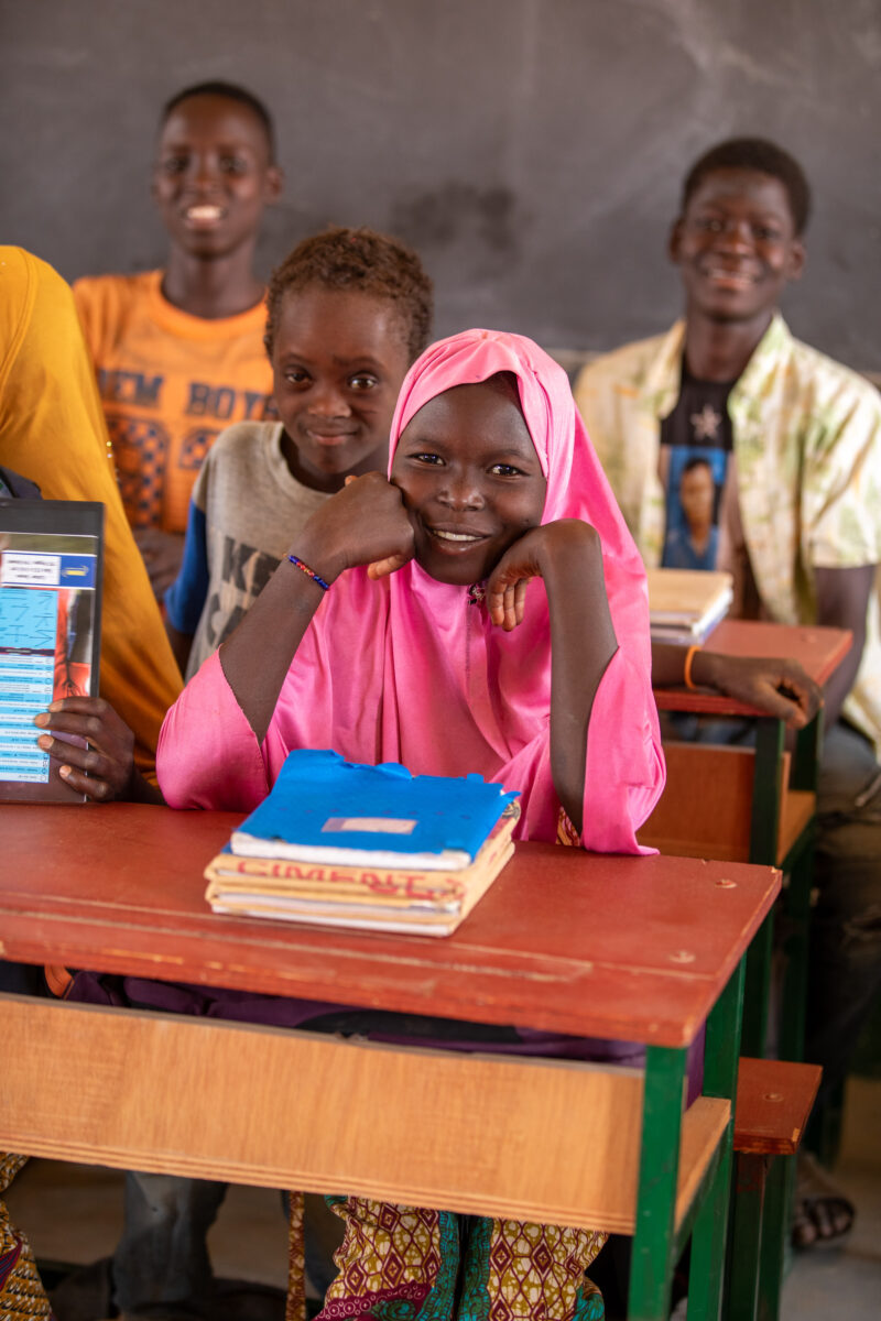 Girl in Niger Attends School — With a long tradition of early marriage, most girls in Niger drop out of school after the second grade — Adult, Africa, Child,...
