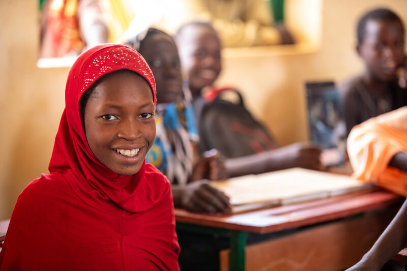 Girl in Niger Attends School — With a long tradition of early marriage, most girls in Niger drop out of school after the second grade — Adult, Africa, Educat...