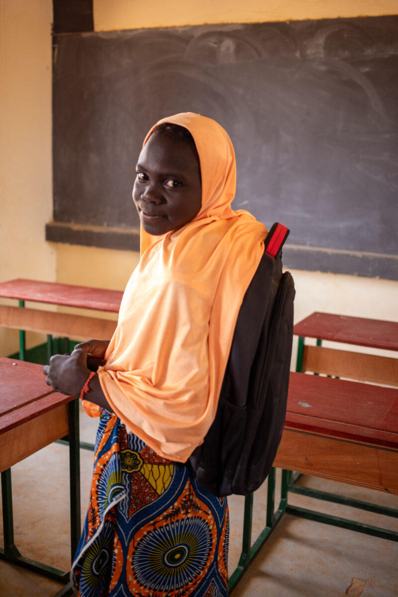 Girl in Niger Attends School — With a long tradition of early marriage, most girls in Niger drop out of school after the second grade — Adult, Africa, Educat...