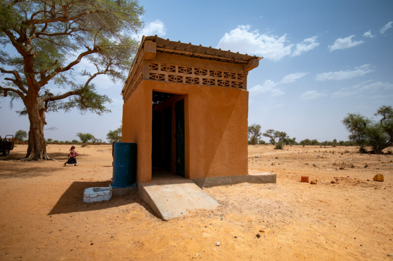 School Sanitation in Niger — Outhouse Toilets make it easier for Children to attend school in Niger, Africa. — Africa, Architecture, Building, Desert, Education