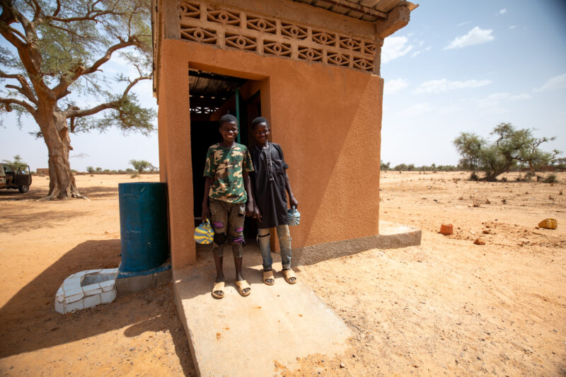 Comfort Rooms in Niger — Students appreciating the Toilets at theit new school in Niger, Africa. — Africa, Desert, Education, Eyes Open, Framing