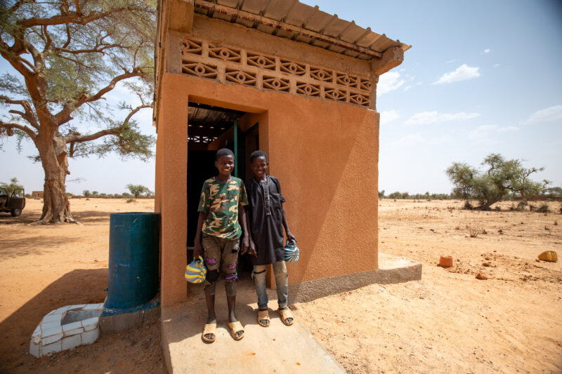 Comfort Rooms in Niger — Students appreciating the Toilets at theit new school in Niger, Africa. — Africa, Desert, Education, Eyes Open, Frontal Face