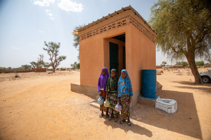 Comfort Rooms in Niger — Students appreciating the Toilets at theit new school in Niger, Africa. — Adult, Africa, Desert, Education, Eyes Open