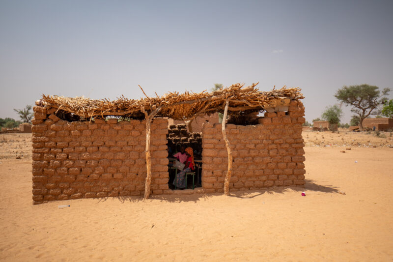 Temporary Classroom — Students in Niger, Africa, attend school in a classroom made of mud and sticks. — Africa, Desert, Education, Nature, Niger