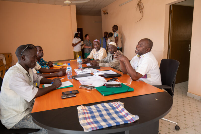 Teacher Training — Teachers attend workshops to learn new methods of teaching in Niger, Africa — Adult, Africa, Beard, Bottle, Drink