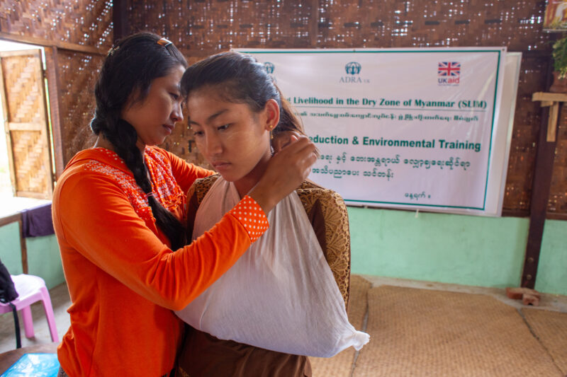 First Aid Training — People in Myanmar learn first aid. — Eyes Open, Female, Frontal Face, Person, Portrait