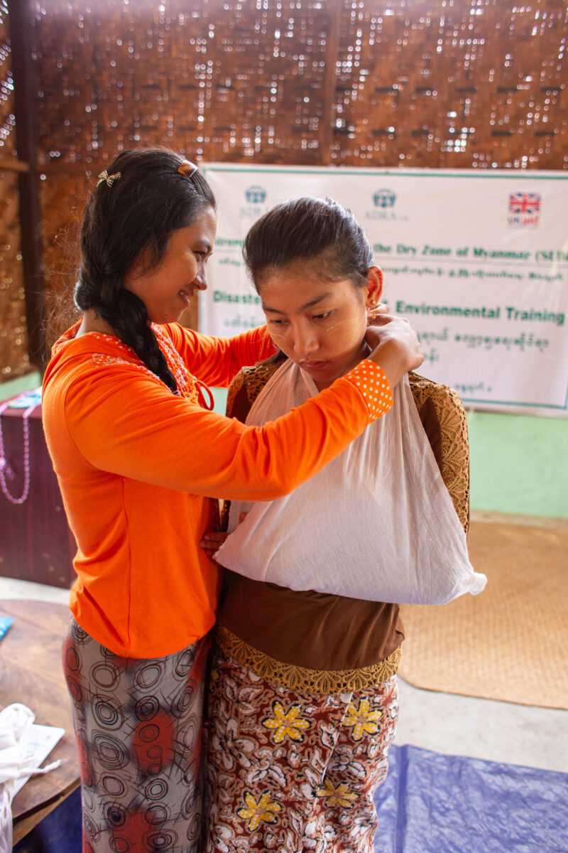 First Aid Training — People in Myanmar learn first aid. — Eyes Open, Frontal Face, Person, Portrait, Profile Face