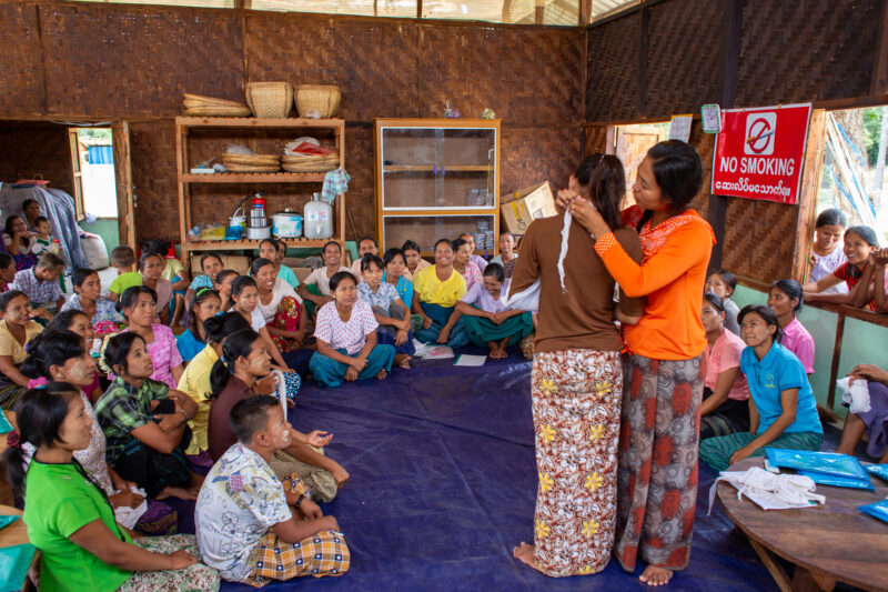 First Aid Training — People in Myanmar learn first aid. — Adult, Architecture, Beard, Building, Eyes Closed