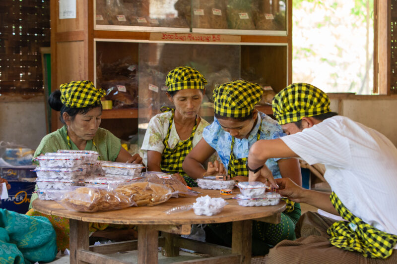 Community Income Group — People in rural Myanmar learn new ways to make income through food processing. — Adult, Beard, Eyes Closed, Frontal Face, Male
