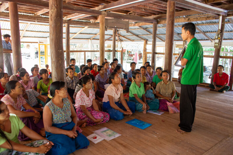 Health Education — Rural community group attends Adult education in health and income generating enterprises. — Adult, Architecture, Beard, Building, Eyes Cl...