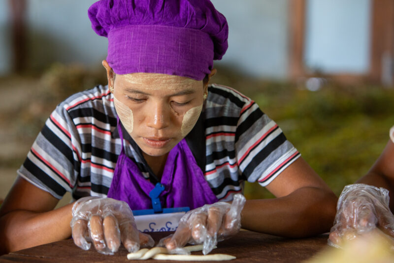 Income through Food Processing — Adult, Blond Hair, Eyes Closed, Frontal Face, One Face