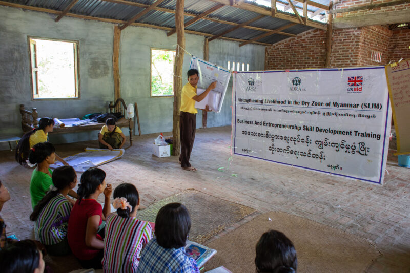 Food Processing Training — People in rural Myanmar learn new ways to make income through food processing. — Architecture, Building, Eyes Open, Frontal Face, ...
