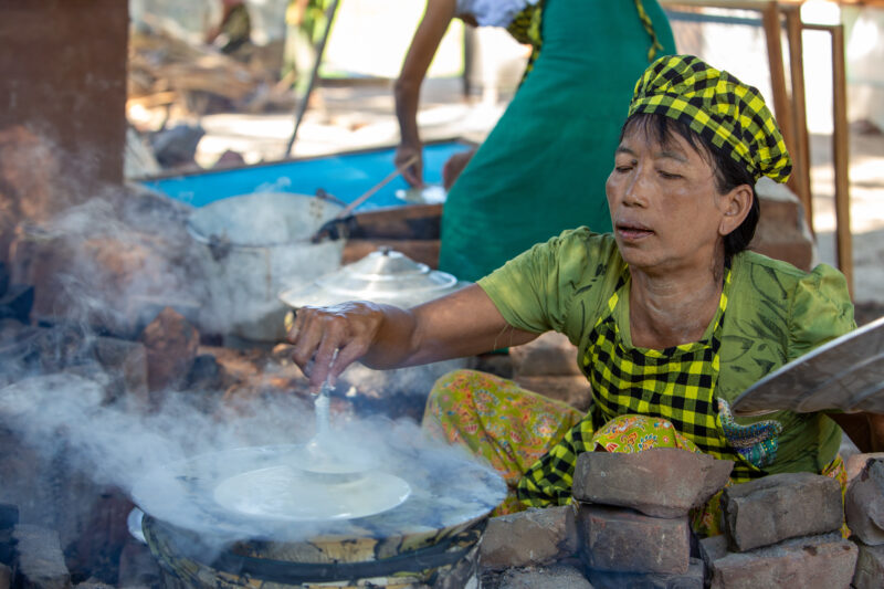 Making Spaghetti — Community income group learn how to make spaghetti as a new way to make income. — Adult, Eyes Closed, Female, Frontal Face, One Face