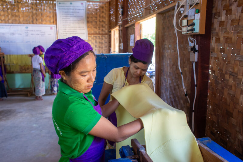 Making Spaghetti — Community income group learn how to make spaghetti as a new way to make income. — Adult, Eyes Closed, Frontal Face, Male, Person