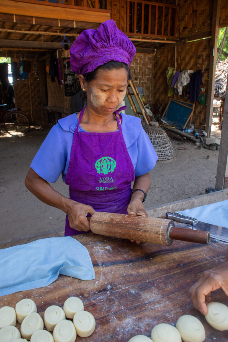 Home Bakery — People in rural Myanmar learn new ways to make income through food processing — Eyes Closed, Female, Frontal Face, One Face, Person