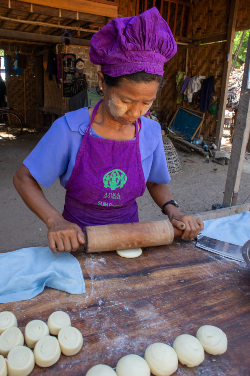 Home Bakery — People in rural Myanmar learn new ways to make income through food processing — Adult, Eyes Closed, Frontal Face, Male, One Face