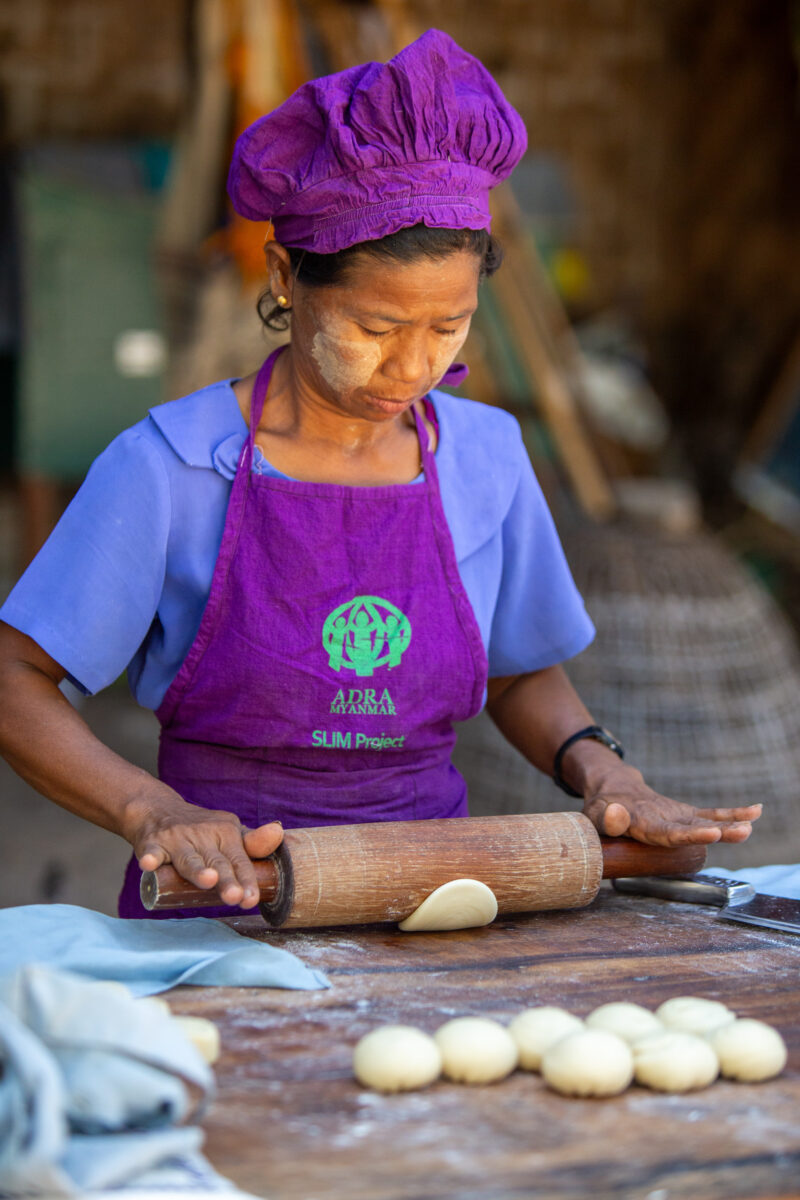 Home Bakery — People in rural Myanmar learn new ways to make income through food processing — Adult, Eyes Closed, Frontal Face, Male, One Face