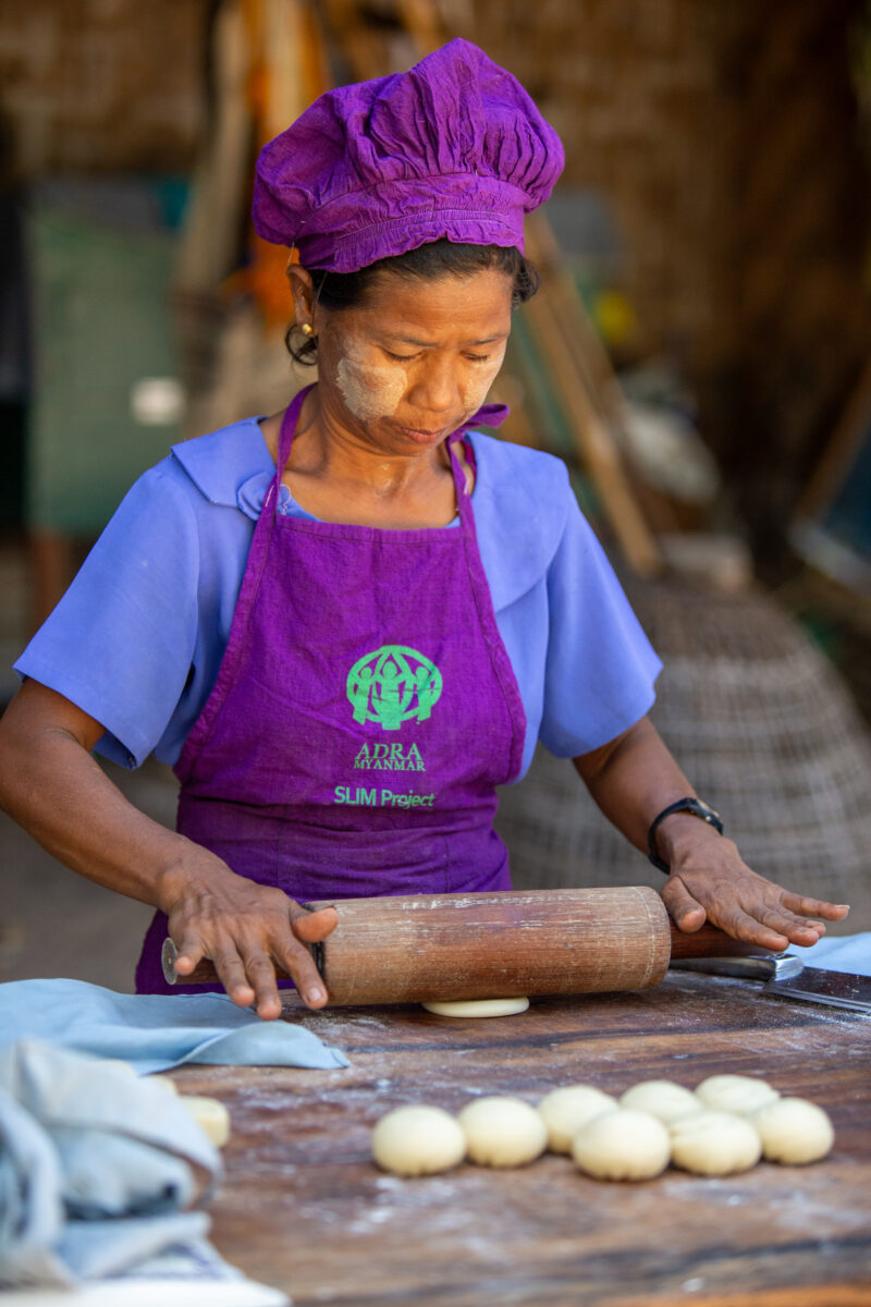 Home Bakery — People in rural Myanmar learn new ways to make income through food processing — Adult, Eyes Closed, Frontal Face, Male, One Face