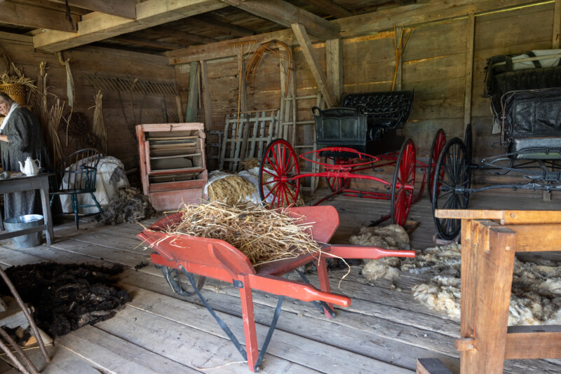 Pioneer Village in New Brunswick — Architecture, Building, Cabin, Person, Vehicle