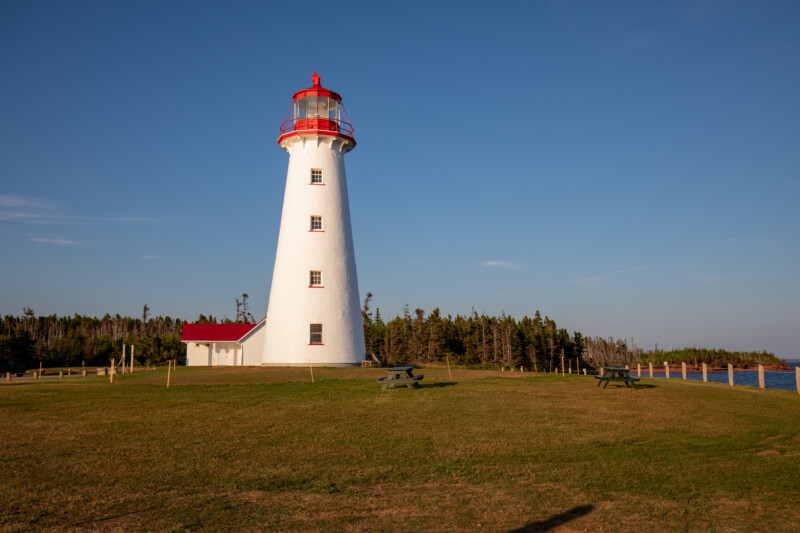 Lighthouse in Prince Edward Island — One of the many lighthouses to visit in PEI. — Architecture, Beach, Building, Complementary Colors, Lighthouse