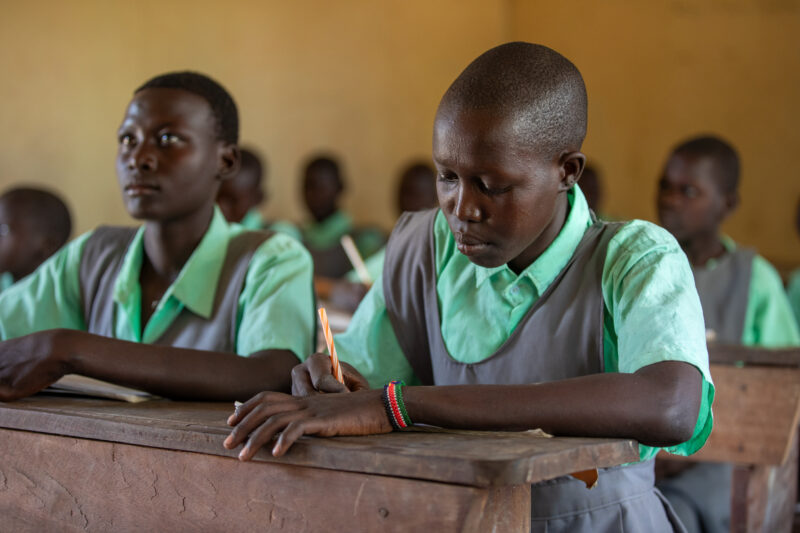 Happy to Be In School — Youn girls in South Sudan Africa are going back to school — Adult, Beard, Eyes Closed, Eyes Open, Frontal Face