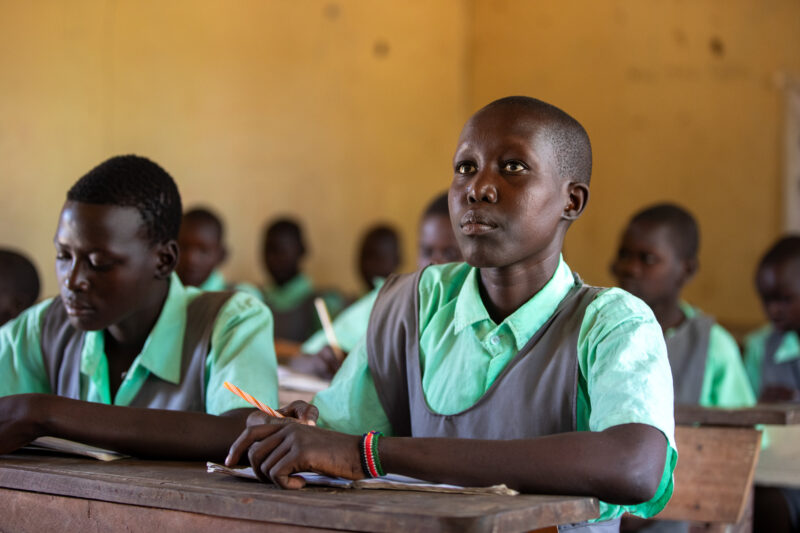 Happy to Be In School — Youn girls in South Sudan Africa are going back to school — Adult, Beard, Eyes Closed, Eyes Open, Frontal Face