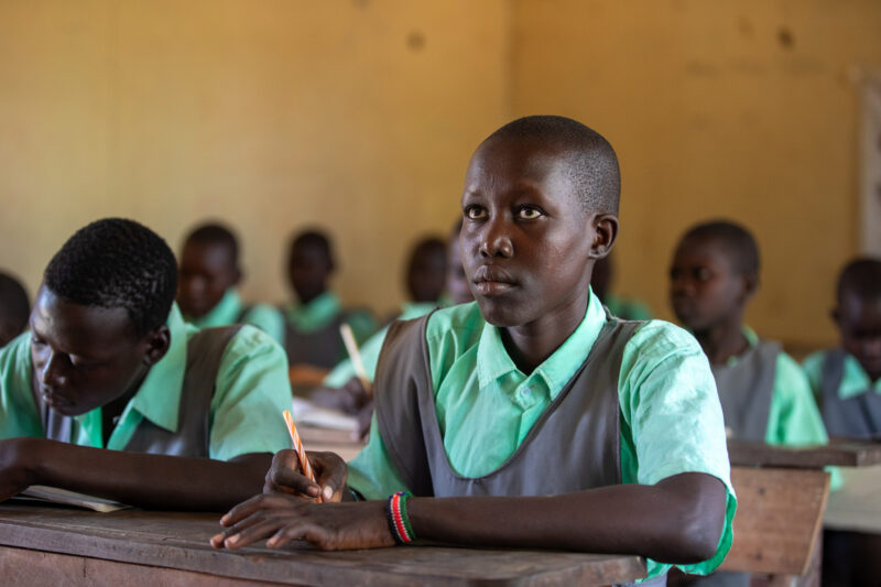 Happy to Be In School — Youn girls in South Sudan Africa are going back to school — Adult, Eyes Closed, Eyes Open, Frontal Face, Male