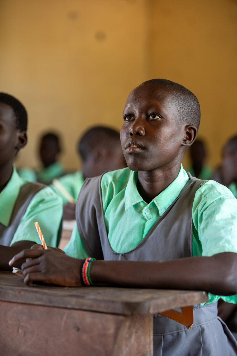 Happy to Be In School — Youn girls in South Sudan Africa are going back to school — Adult, Eyes Open, Frontal Face, Male, One Face
