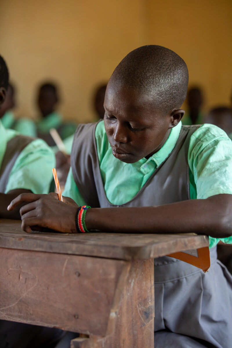 Happy to Be In School — Youn girls in South Sudan Africa are going back to school — Adult, Beard, Eyes Closed, Frontal Face, Male